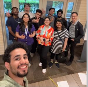 A group of people smiling